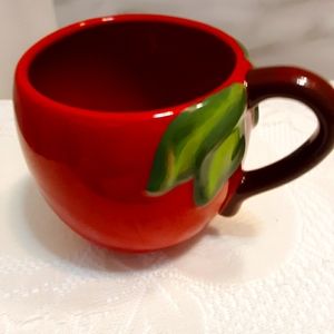 Mug for coffee tea soup. Red apple